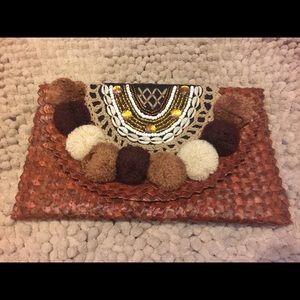 Beaded Straw Clutch with Pom-Poms